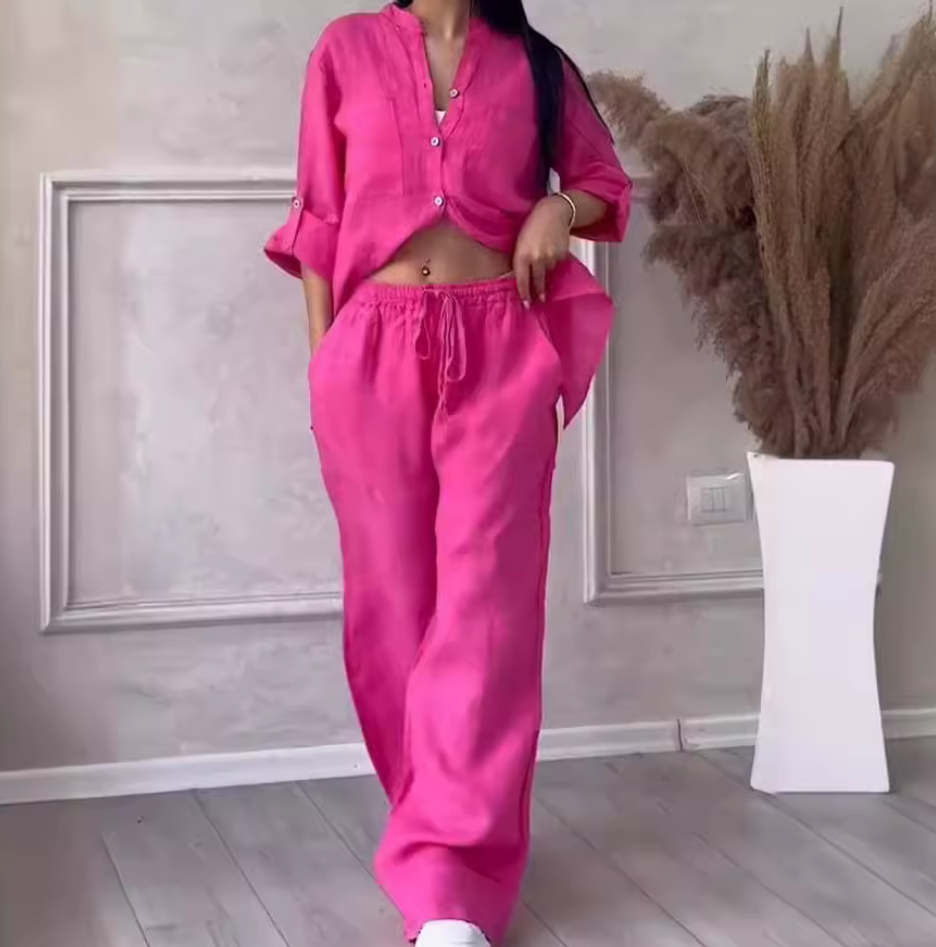 Tvådelat kostymset med topp och vida byxor – Elegant, självsäker och modernt stilren