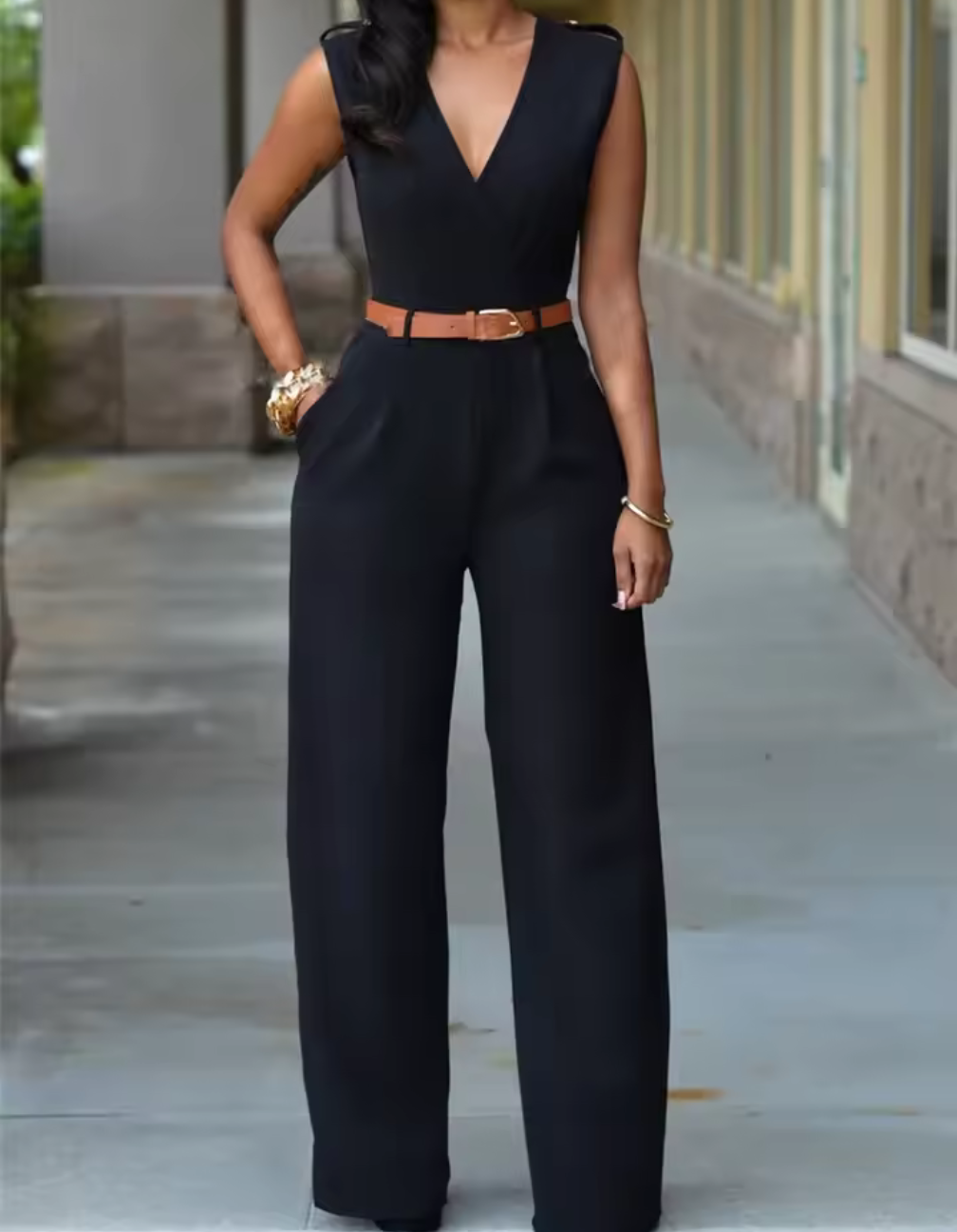 Elegant ärmlös jumpsuit med markerad midja – flera färger