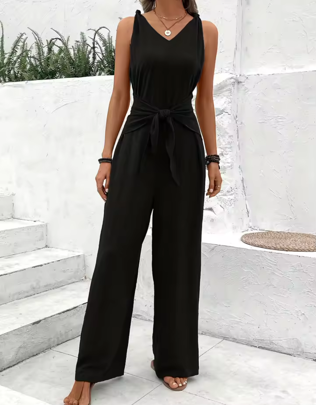 Elegant ärmlös jumpsuit med knytband – Svart