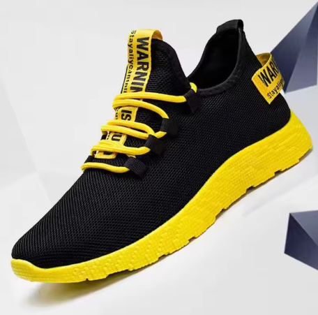 Svarta Sneakers med Gula Detaljer – Energi & Stil i Ett